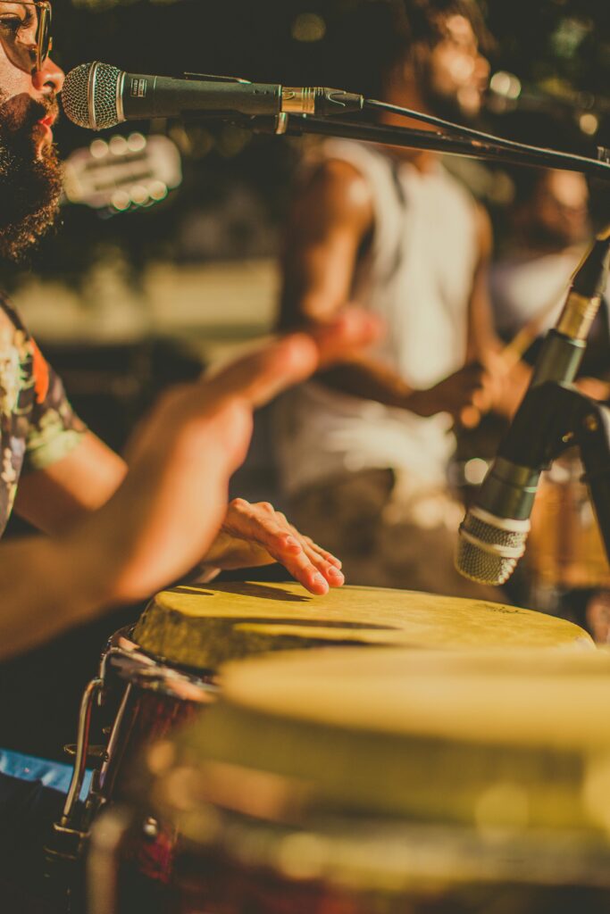 Engaging street performance featuring a drummer with a focus on hand percussion in San Juan.